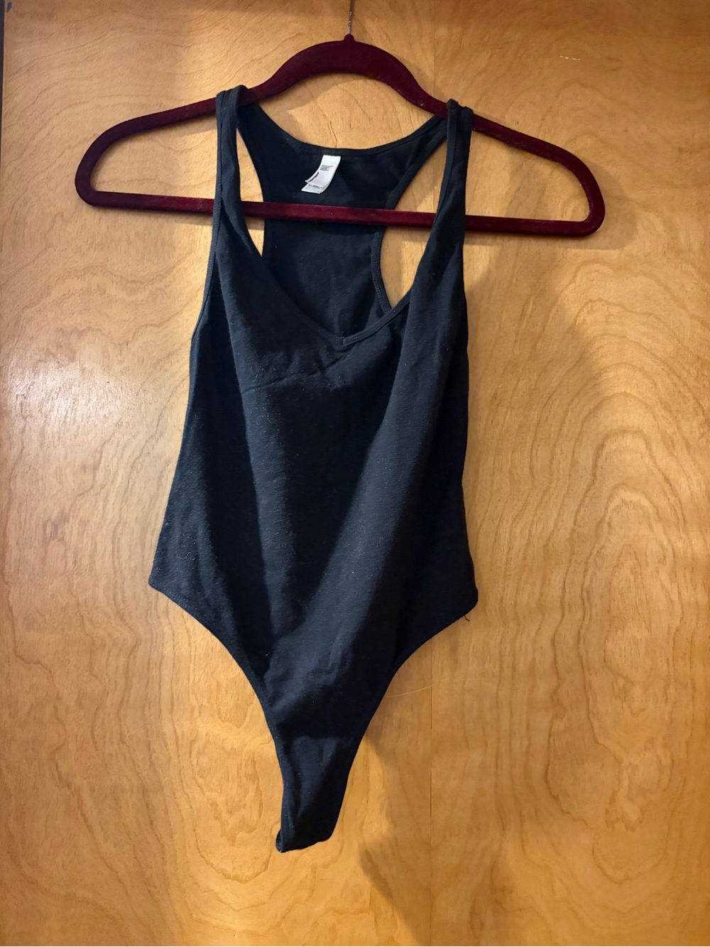 Women’s Black One-Piece Racerback Bodysuit
